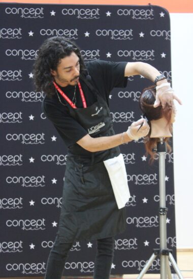 Matt from L'Oréal Professional demonstrates applying colour while talking about his career journey.