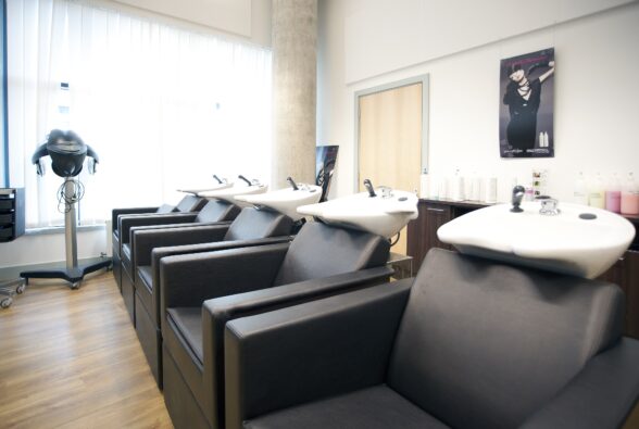 The hair washing area in the salon at Bracknell and Wokingham College.